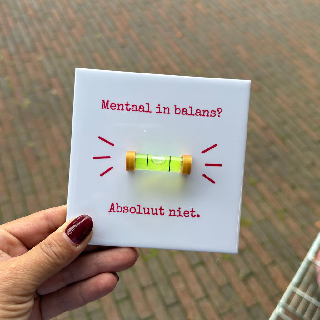 Tegeltje ‘Mentaal in balans? Absoluut niet.’ – met echte waterpas