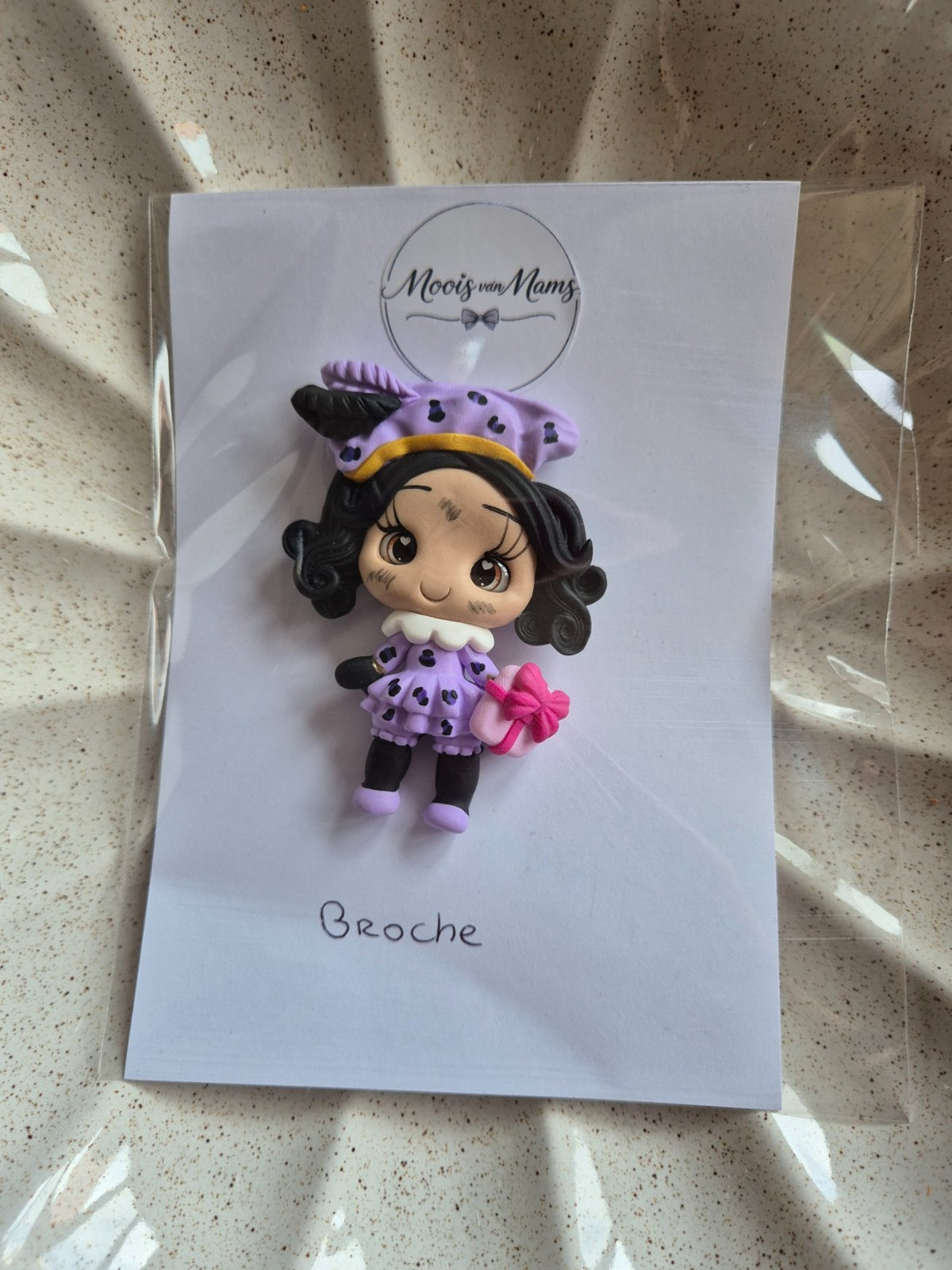 6973ca546c51700180f9ca2f_broche-piet-paars_1793189781085.jpg