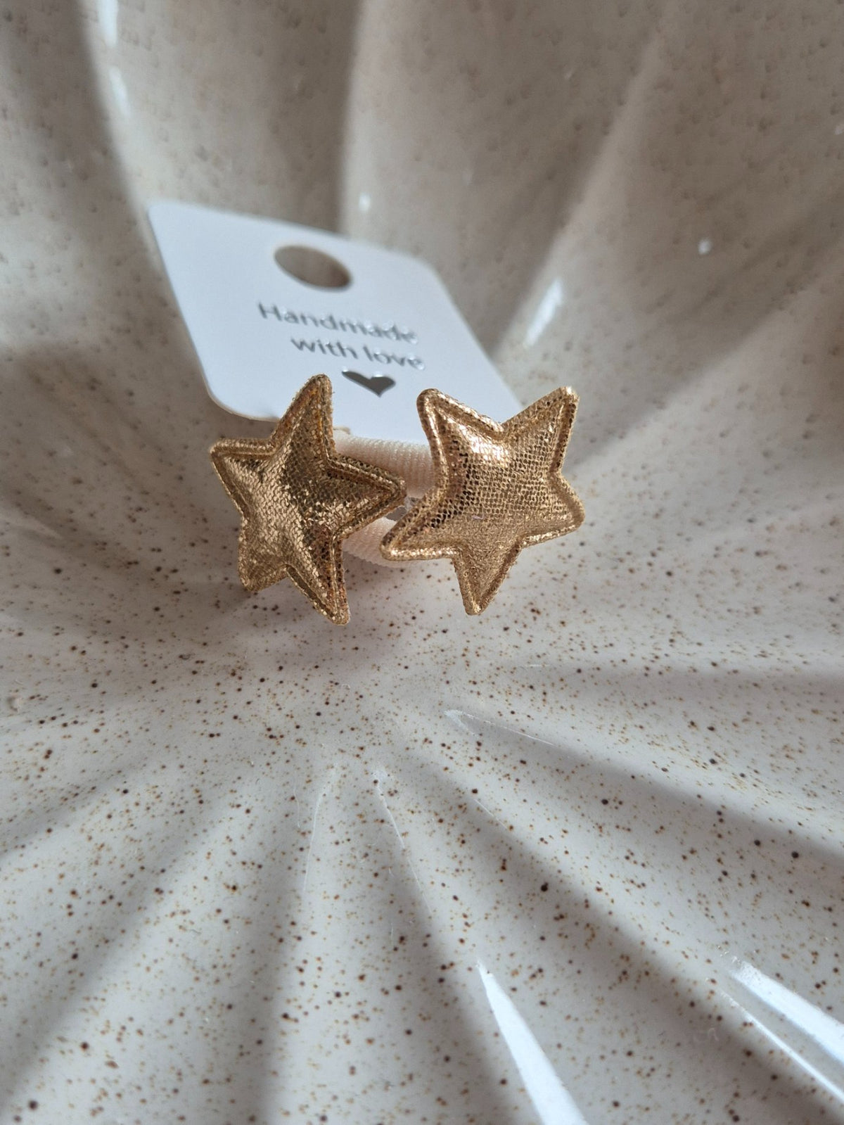 6973ca546c51700180f9ca2f_glitter-ster-elastiek-goud_1793189634543.jpg