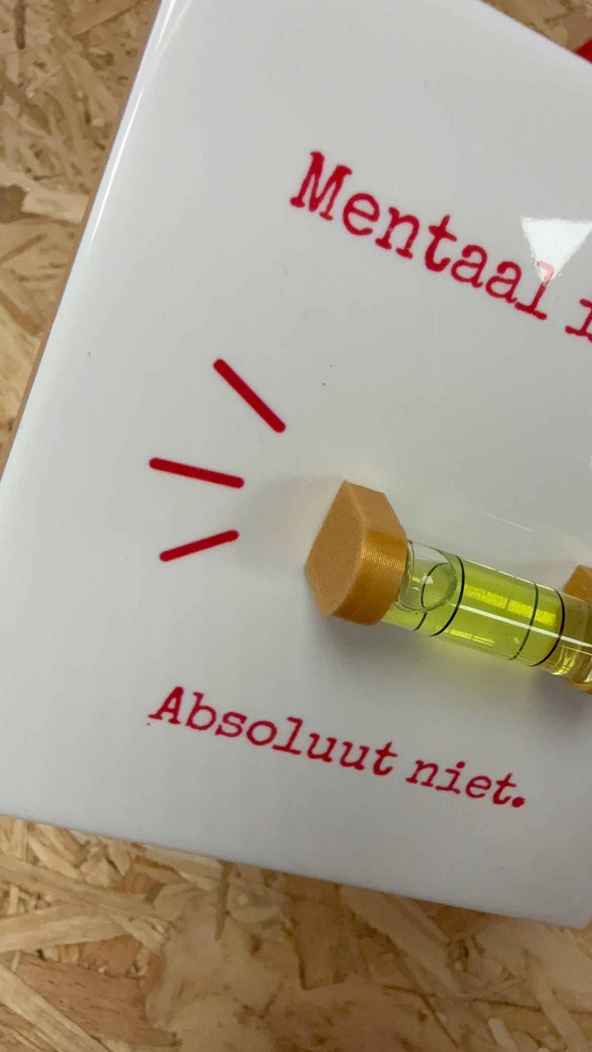 Tegeltje ‘Mentaal in balans? Absoluut niet.’ – met echte waterpas