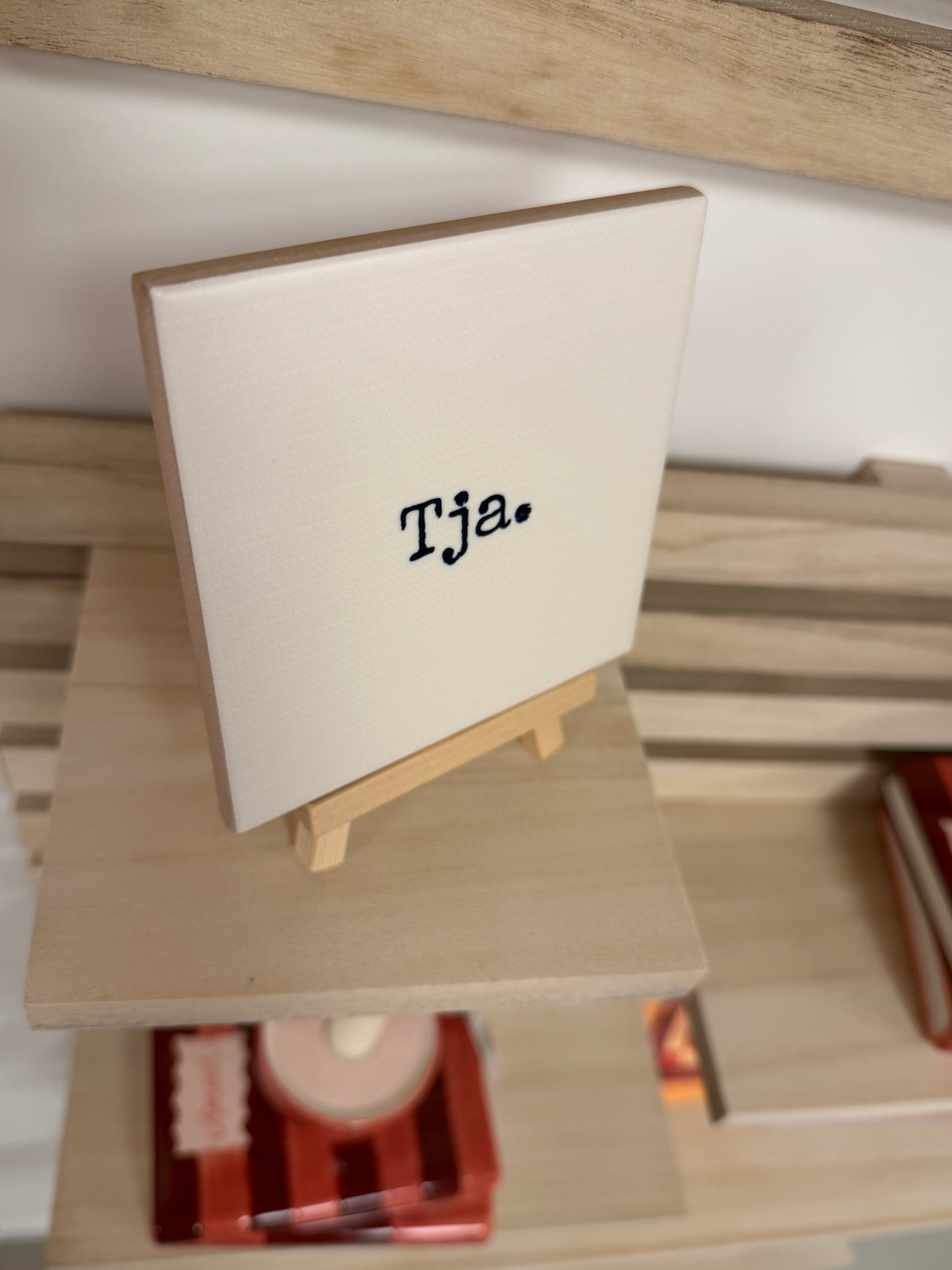 Tegeltje - Tja.