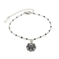 MYKK Jewelry | RVS Zeeuwse knop armband - Zwarte accenten